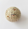 Historický golfový míček Dunlop, Anglie c 1925